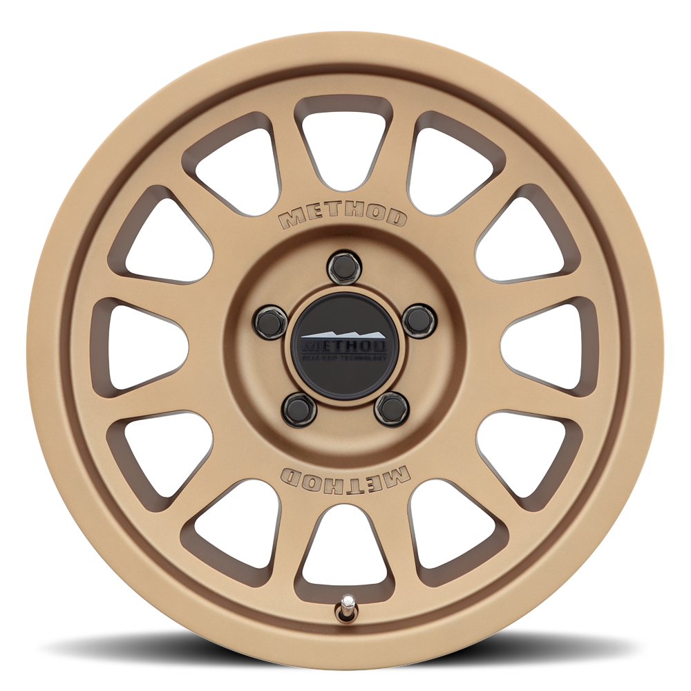https://serenity-foxfactory.asset.akeneo.cloud/fox_asset_family/media/MRW_703_Bronze_5lug_Studio_Front.png https://serenity-foxfactory.asset.akeneo.cloud/fox_asset_family/media/MRW_703_Bronze_5lug_Studio_Front.png