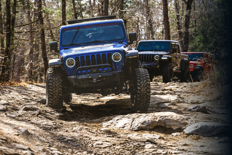 Jeep Wrangler on off-road trail - Are You J-Rated? Discover your ideal lift kti at JKS Suspension