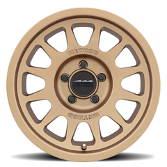 https://serenity-foxfactory.asset.akeneo.cloud/fox_asset_family/media/MRW_703_Bronze_5lug_Studio_Front.png